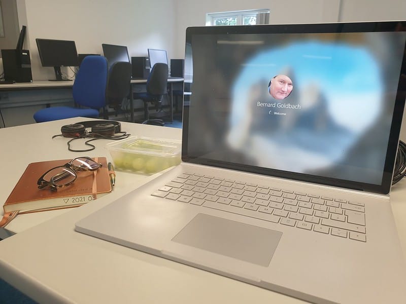 Surface Book and Leuchtturm 1917 with grapes on campus